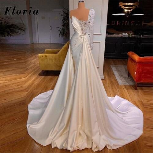 2021 Pearls Beaded Bride Dresses Saudi Arabia Long Mermaid One Shoulder Long Sleeves Wedding Dresses Bridal Gown Robe De Mariee