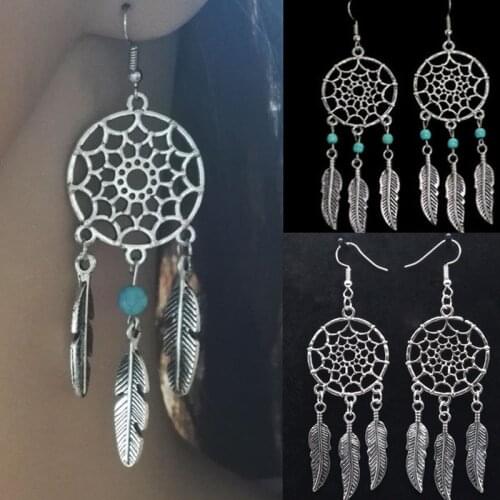 Promotion Price Fashion Anti Allergy Zinc Alloy Stainless Steel Feather Pendant Drop Earring For Women Female 2021 Made In China
