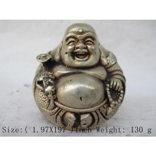 The ancient Tibetan Buddhism in China. Smiling Buddha hand flexibly