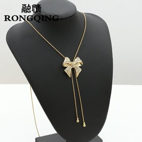 RONGQING 12Pcs/lot Hollow Rhinestone Bowknot Pendant Sweater Chain Necklace Long Tassel Necklace Collares Largos