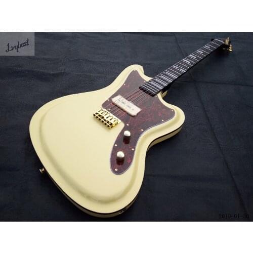 High Quality electric guitar solid cream body,scallop shape edge,brownish neck ,ebony fingerboard,white inlay,customized logo