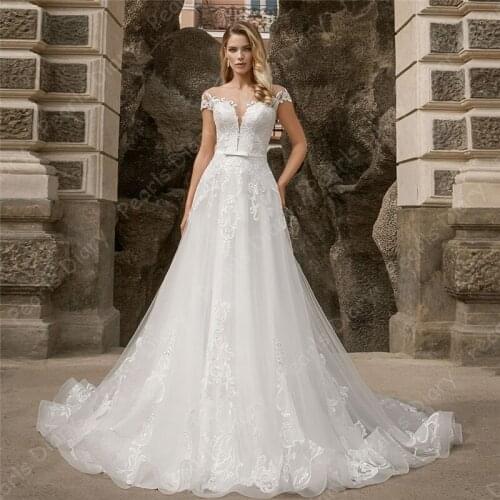 Chic Summer Tulle Sweep Train A-line Bridal Gowns O-neck Cap Sleeve Applique Sash Wedding Dress for Bride 2021 Vestido De Noiva