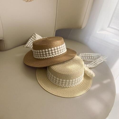 2021 Korean spring and summer baby travel flat top big edge sun hat sun hat small fresh lace bow boys and girls straw hat