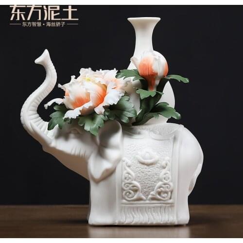 Clay ceramic flower furnishing articles dehua white porcelain elephant home decoration crafts/wealth and good luck