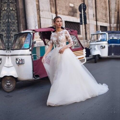 Applique Lace A Line Wedding Dresses Tulle O Neck Bridal Gown Wedding Gowns Long Sleeve Vestido de Noiva 2021 Floor Length