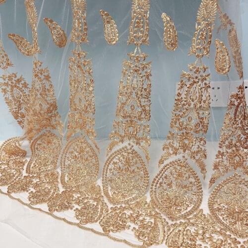 1meter mesh lace gold three-dimensional embroidery fabric / high-end custom apparel fabric / encryption embroidery French lace