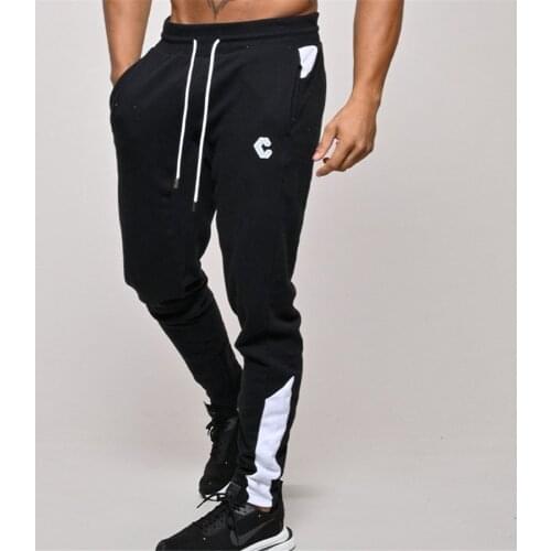 2021 New Men Gyms Workout Pants Fashion stitching Outdoor Jogger Bodybuilding Pants Casual Stretch Letter Printed Pants