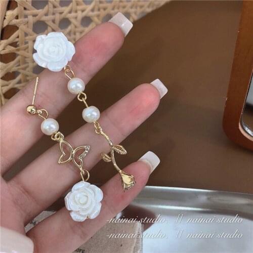 Ear clip flower retro temperament earrings long super fairy earrings female asymmetric rose earrings new trend