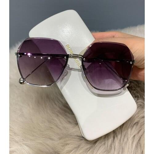 Sunglasses with round face on the sea without frames, womens protection against ultraviolet