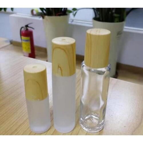 Frosted Clear Glass Roller Bottles Vials Containers with Metal Roller Ball and Wood Grain Plastic Cap for Essential Oil bottles