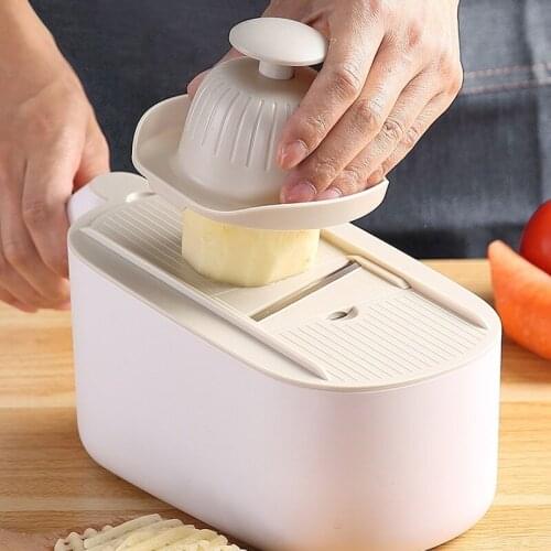 Multifunctional slicer for scraping and slicing in kitchen