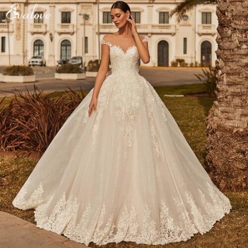 EVALOVE Gorgeous Appliques Cap Sleeve Bride A-Line Wedding Dresses 2021 Elegant Scoop Neck Lace Up Beading Vintage Bridal Gown