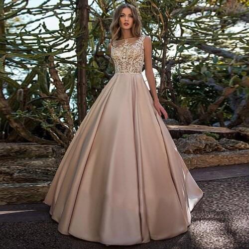 Amazing Champagne Satin Bateau Neckline See-through Bodice A-line Wedding Dresses Lace Applique Button Down Bridal Dress