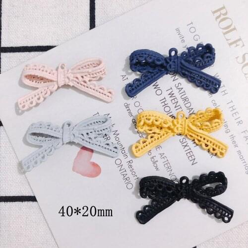 Free Shipping 30pcs 40*20mm Rubber Enamel Alloy Lace Ribbon Knot Bow Charms Ornament Accessories Girls Necklace Pendant Earring