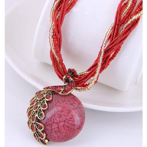 European and American Exaggerated Necklace Korean of Bohemia Ethnic Wind Retro Ladies Rice Bead Weater Chain Peacock Pendant