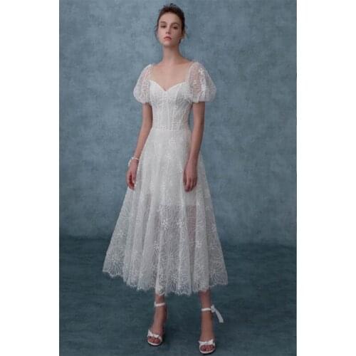 Summer new embroidery lace puff sleeve hollow white dress female ladies French temperament fairy long skirt