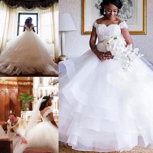 African Tiered Ruffles Ball Gown Wedding Dresses White Sweetheart Cap Sleeves With Beading Belt Sweep Train Bridal Gowns