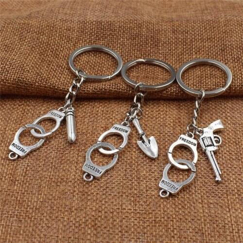 Creative fashion charm criminal personality keychain, best friend necklace set, couple friendship gift jewelry keychain