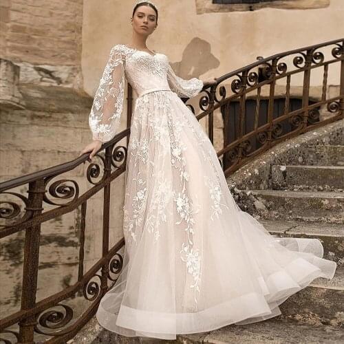 A-Line Wedding Dresses Sparkly Tulle Illusion O Neck Full Lantern Sleeves Appliqued 2021 Floor Length Bridal Gown