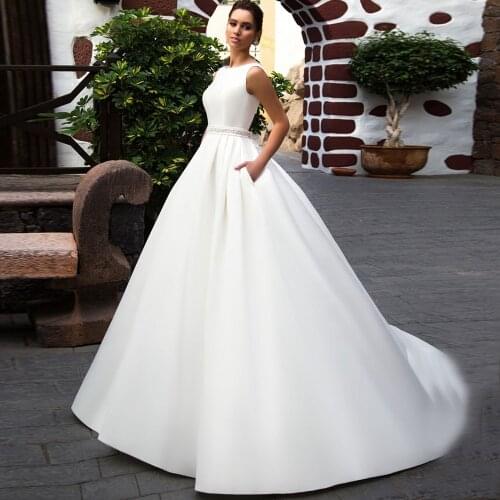 Gorgeous A-line White Ivory Satin Wedding Dresses with Pockets Beaded Open Back Robe de Mariage Plus Size Bridal Gown