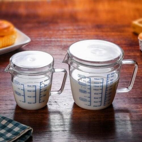Heat-resistant glass milk measuring cup heating water scale cup baking measuring cup with lid