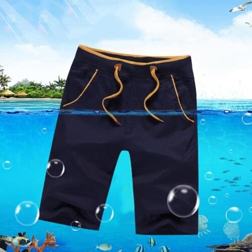 Mens Summer Breeches Shorts Solid Color Sports Shorts Knee Length Men Drawstring Multi Pockets Training Shorts Streetwear 2021