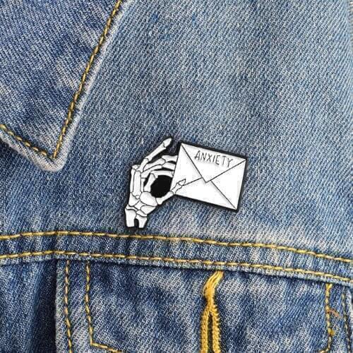 Hand bone hand holding envelope personality brooch Halloween hip hop fan personality jewelry denim clothing backpack badge gift