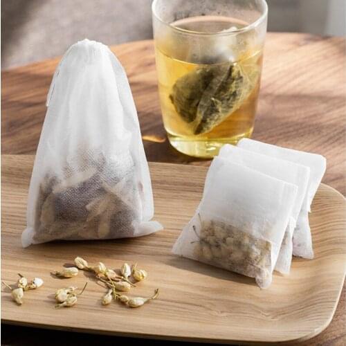 China disposable filter bags PET non-woven food grade biodegradable tea paper bag with drawstring