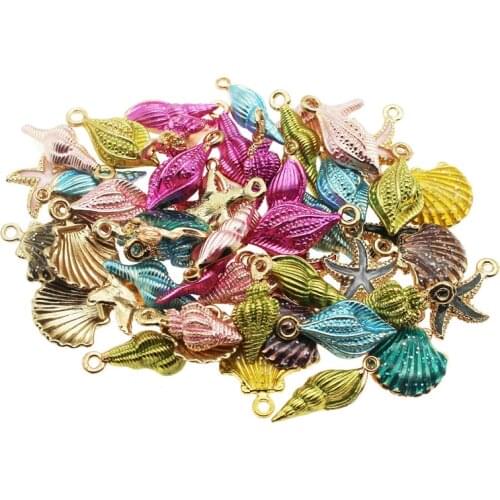 Exquisite ornaments 20pcs pieces of color alloy enamel mixed shell starfish conch jewelry pendant crafts discovery.Randomly send