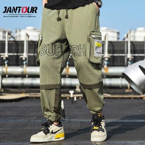 Plus Size Multi-Pockets Cargo Pants Men Streetwear Baggy Jogger Pants Letter Printed Harem Pants Pantalones De Hombre 3XL 4XL