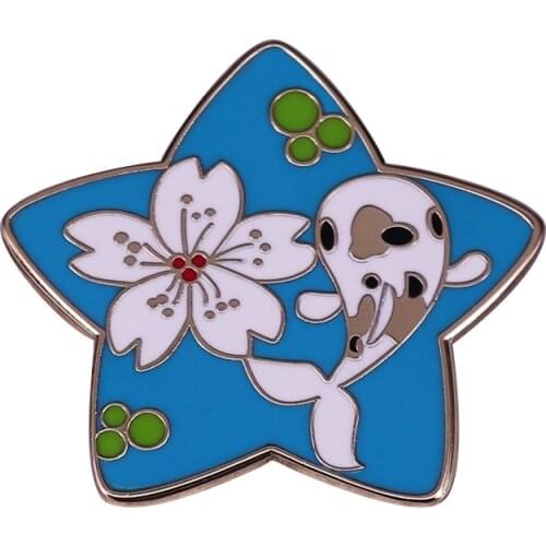 Beautiful Lilninja Star Pin Brooch It depicts a koi fish peacefully swimming through a pond while a cherry blossom floats by
