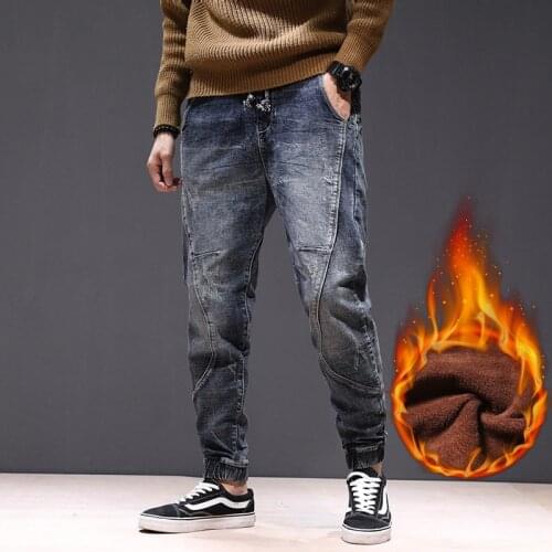 2021 New Fashion Streetwear Men Jeans Loose Fit Spliced Designer Ripped Harem Jeans Cargo Pants Elastic Waist Hip Hop Jeans