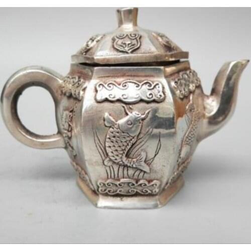 Chinas pure white copper carving carp teapot