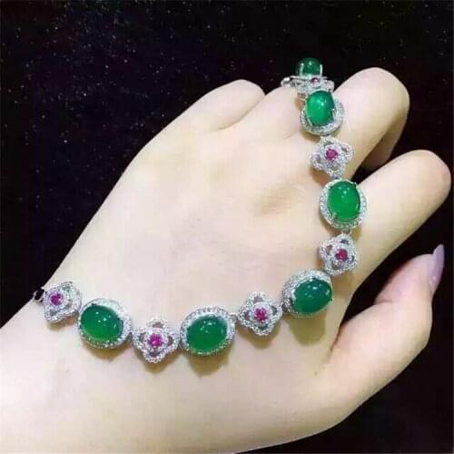 KJJEAXCMY fine jewelry S925 Pure silver inlay natural green jade medulla female style bracelet plant four-leaf grass ornaments