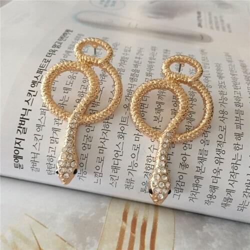 Gorgeous Gold Color Plating Black Eye Clear Stone Decorated Stagger Snake Stud Earrings For Women Girl Wild Sexy Club Jewelry
