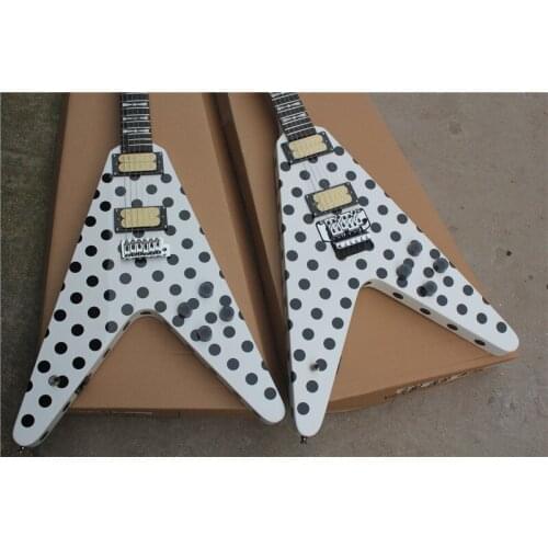 Custom 6 string guitar,irregular V shape white black dot body,tremolo bridge, HH pickups,neck set in body