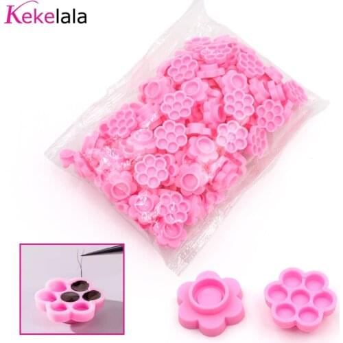 2021 Newest Flower Shape 100pcs Eyelash Extension Glue Delay Holders Grafting Eyelashes Holding Trays in Bulk