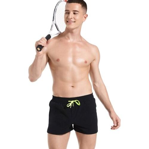 2020 Men New Beach Pants Solid Color Quick Drying Pants European And American Fashion Slim Sports Shorts Beach Swimming Sports