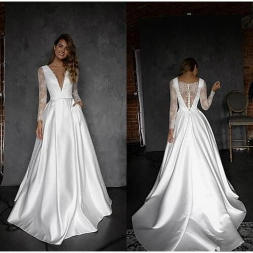2020 Lace Wedding Dresses V Neck Long Sleeves Button Back Appliques Beach Bridal Gowns Custom Made Sweep Train Wedding Dress