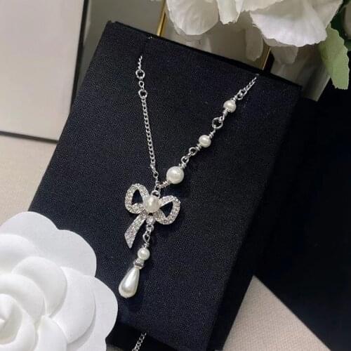 Hot selling designer fashion luxury jewelry for women, vintage pearls and bow design necklaces, gifts for girls. Party accessori