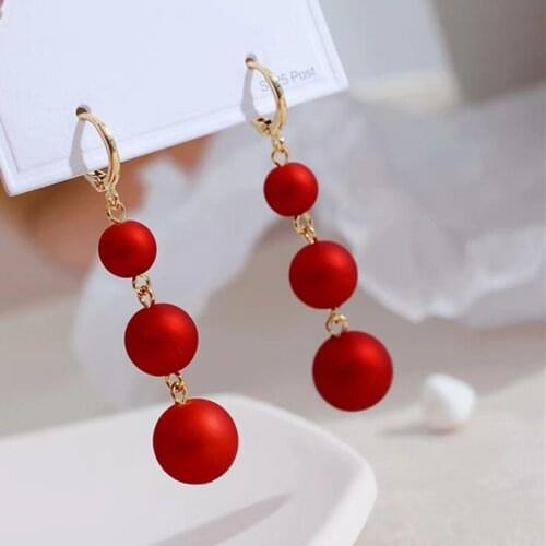 Sweet Girl Earrings Fashion New Red White Ball Earrings New Year Festive Temperament Long Tassel 2021 New Net Red Earrings