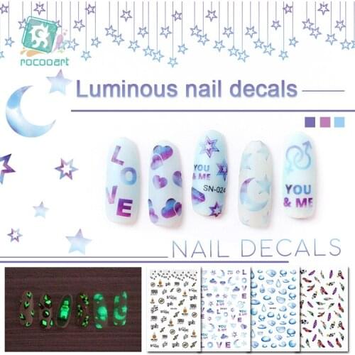 Rocooart Glowing Water Nail Stickers Letters Feathers Devil Eyes Designs Sliders For Nail Decals DIY Manicure Luminous Nail Art