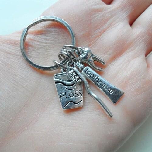 European and American Dentists Health Toothbrush Toothpaste Dental Floss Tooth Creative Backpack Pendant Alternative Keychain