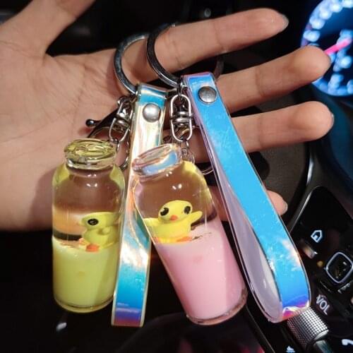Cute Little Duck Doll Keychain Cylindrical Acrylic Milk Liquid Floating Keyring Pendant Personality Drifting Bag Key Chains Gift