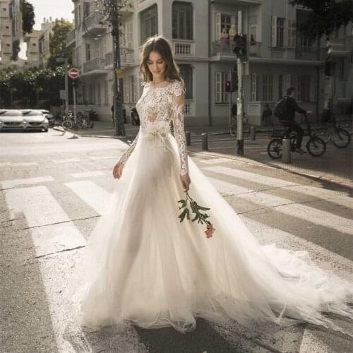 Sexy Boat Neck Long Sleeves Backless Lace Wedding Dresses A Line Transparent Bridal Gowns Robe de mariage 2021 Vestido de Noiva