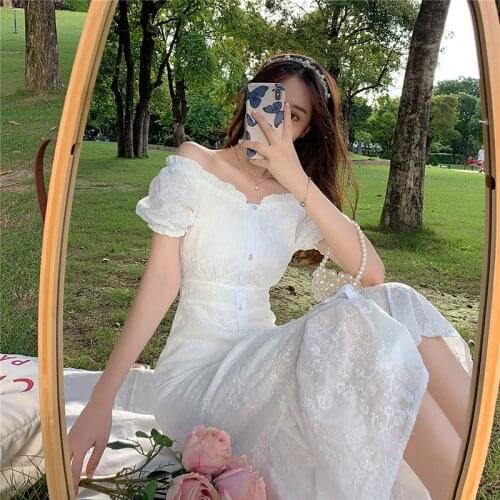 Fairy white dress female 2021 new summer French temperament fishtail Single breasted puff sleeves mid-length thin waist dress
