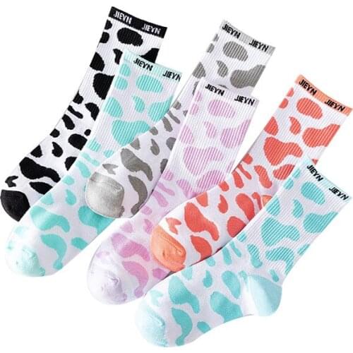 Street hip-hop creative personality socks cute cow point European and American style fashion clear in tube men and women socks