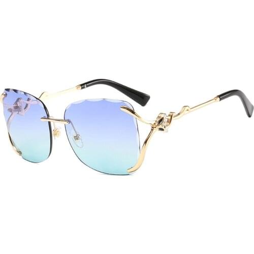 New Retro Rimless Decoration Sunglasses Female Diamond Personality Metal PC Frame Sun Glasses Oversized Square Eyeglasses UV400