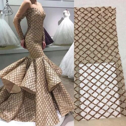 Champagne Prom Dresses 2020 Mermaid Long Sleeve Sparkly Sequins Ruffled Gold Evening Dress Sheer Neck Formal Gown Robe de soiree