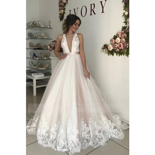 2020 Plunging Illusion Tulle Neck Lace Wedding Dress with A Belt Criss Cross Court Train Applique Edge Wedding Ball Gown Bridal